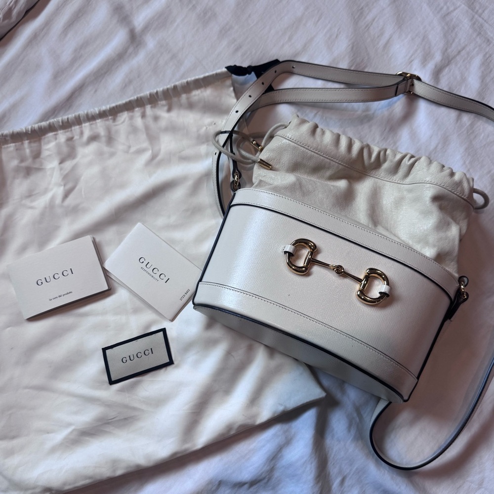Bucket / drawstring bag with horsebit hardware (classic Gucci detail)
